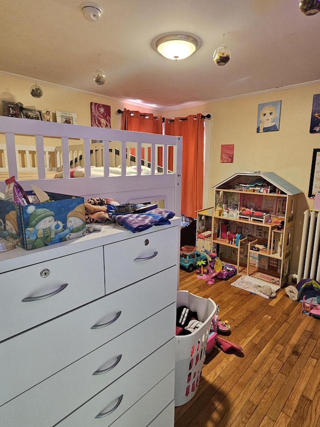 bedroom featuring hardwood / wood-style flooring