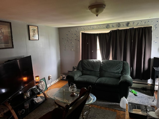 10 Russ St, Caribou, ME 04736 - living area with baseboards and wood finished floors