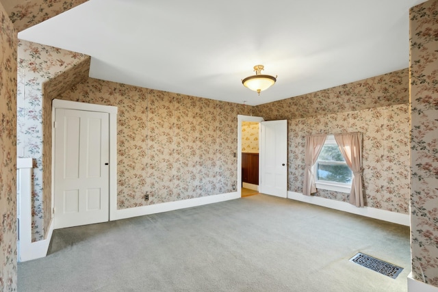 spare room with carpet flooring