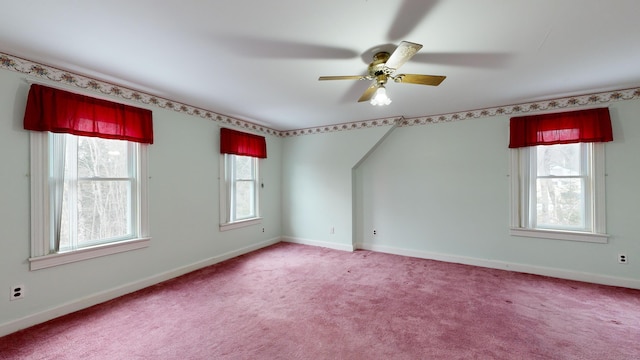 spare room with carpet, ceiling fan, and plenty of natural light