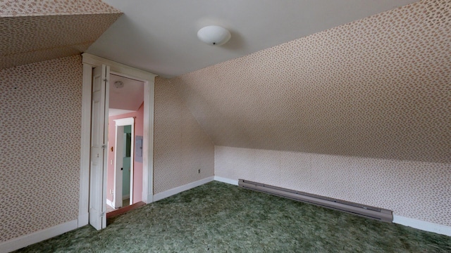 bonus room with lofted ceiling, dark colored carpet, and a baseboard radiator