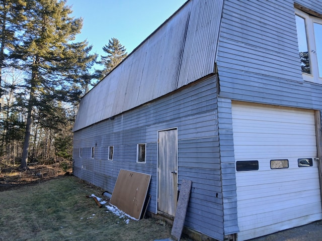 view of property exterior featuring a garage