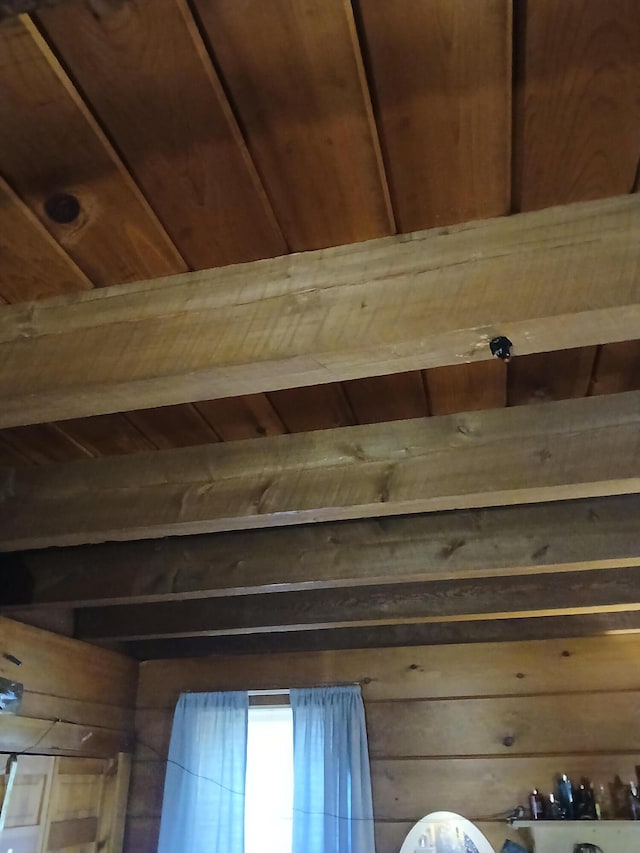 room details with wood ceiling and wooden walls