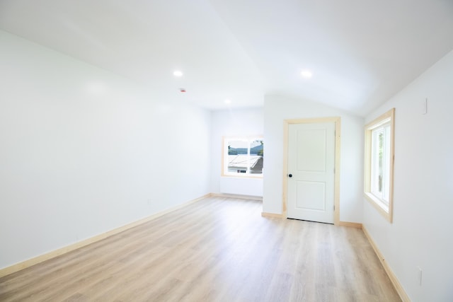 284 Flanders Pond Rd, Sullivan, ME 04664 - unfurnished room featuring plenty of natural light, light wood finished floors, lofted ceiling, and recessed lighting