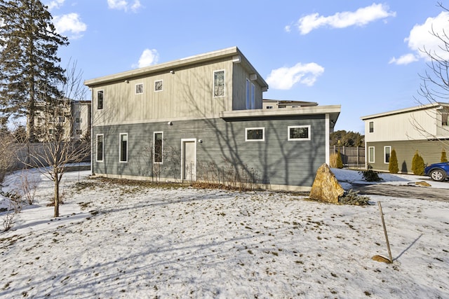 view of snow covered property