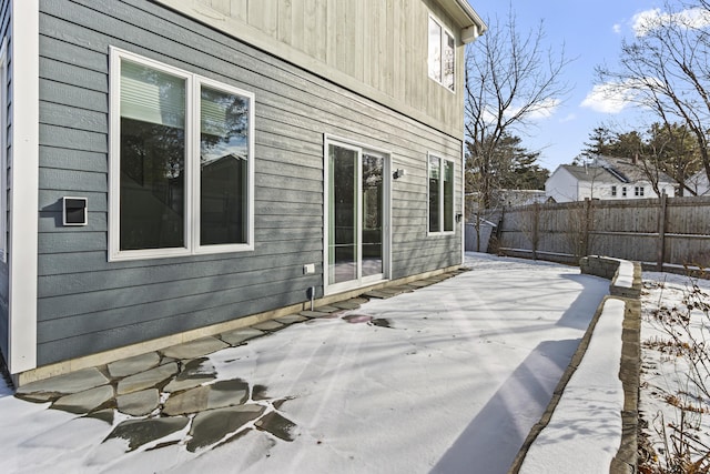 view of side of property featuring a patio area