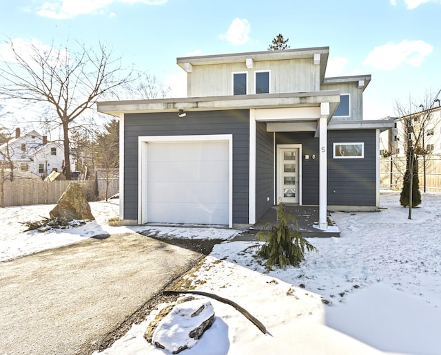 view of front of property featuring a garage