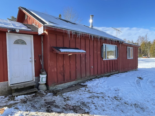 view of snow covered property