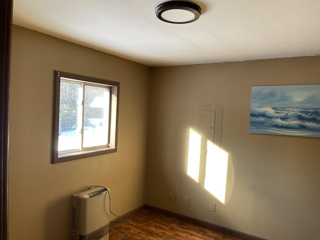 empty room featuring dark hardwood / wood-style floors