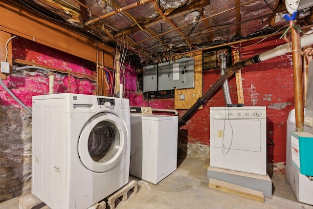 washroom with electric panel and independent washer and dryer