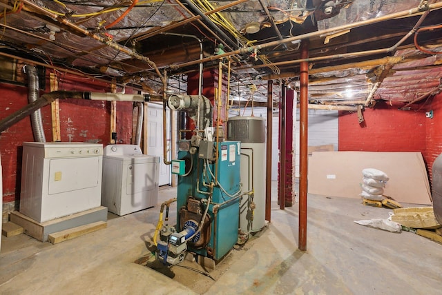 basement featuring gas water heater and independent washer and dryer