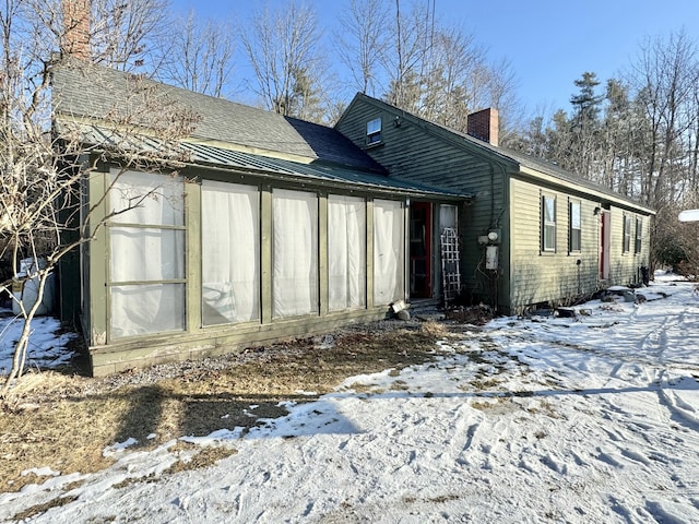 view of snow covered property