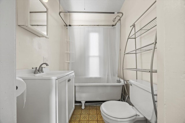 full bathroom with vanity, shower / bath combination with curtain, and toilet