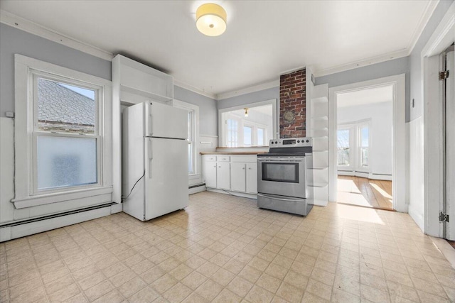 kitchen with white cabinets, baseboard heating, white fridge, and stainless steel range with electric stovetop