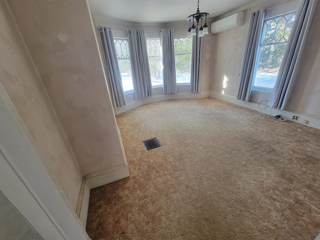 unfurnished dining area featuring a notable chandelier, carpet, ornamental molding, and a wall mounted air conditioner