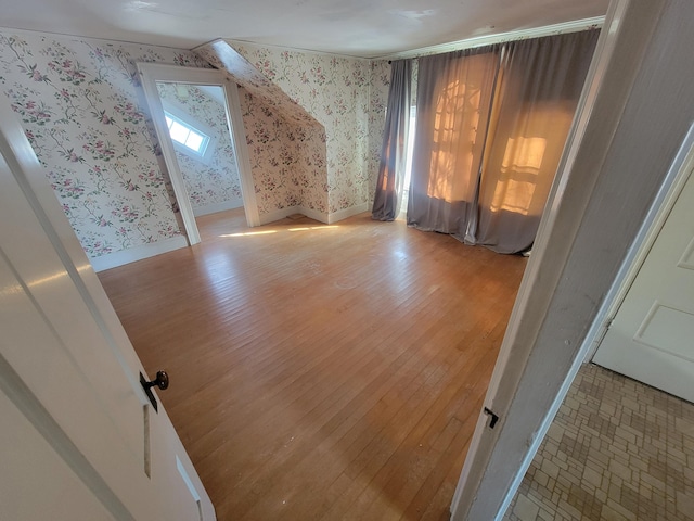 bonus room featuring hardwood / wood-style flooring