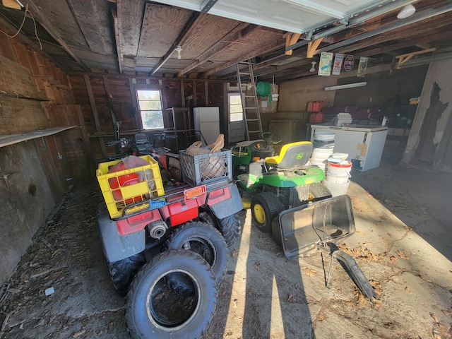 garage featuring white refrigerator