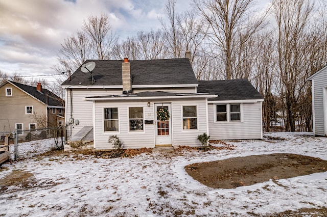 view of snow covered house