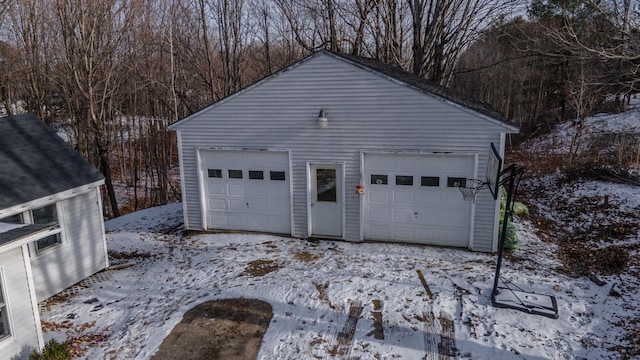 view of snow covered garage