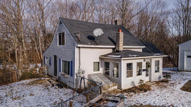 view of snow covered house