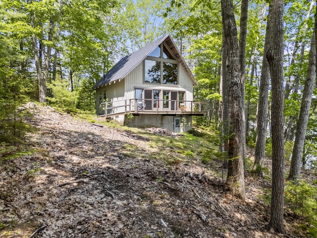 36 Storer Rd, Bremen, ME 04551 - rear view of house with a wooden deck
