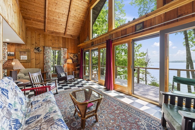 36 Storer Rd, Bremen, ME 04551 - sunroom / solarium featuring wood walls, a water view, tile patterned floors, high vaulted ceiling, and a wooden ceiling with exposed beams