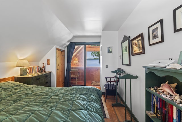 36 Storer Rd, Bremen, ME 04551 - bedroom featuring access to outside, wood finished floors, and vaulted ceiling