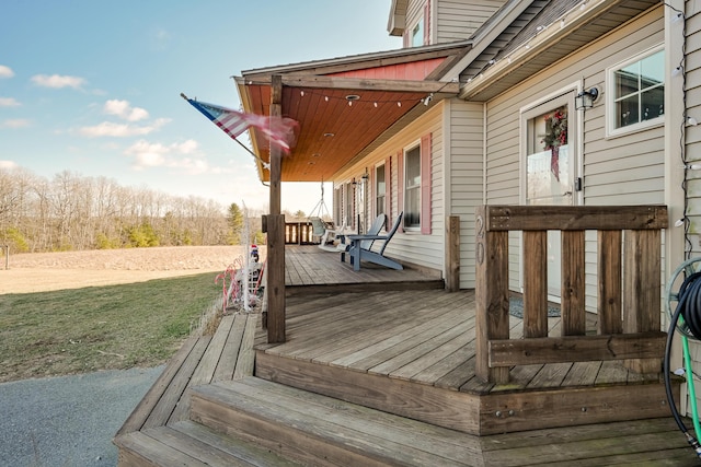 deck featuring covered porch