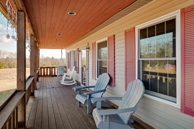 wooden terrace with covered porch