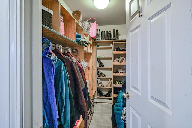 spacious closet featuring a baseboard radiator