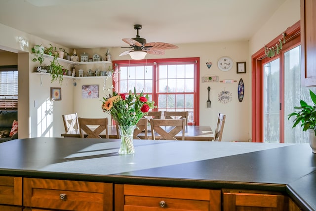 kitchen with ceiling fan and a healthy amount of sunlight