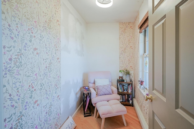 sitting room featuring light wood-type flooring