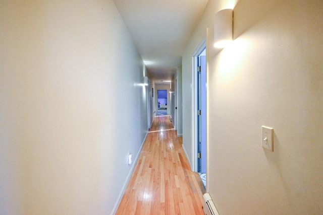 hallway featuring hardwood / wood-style floors