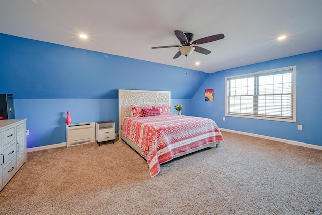 bedroom featuring lofted ceiling, light carpet, and ceiling fan