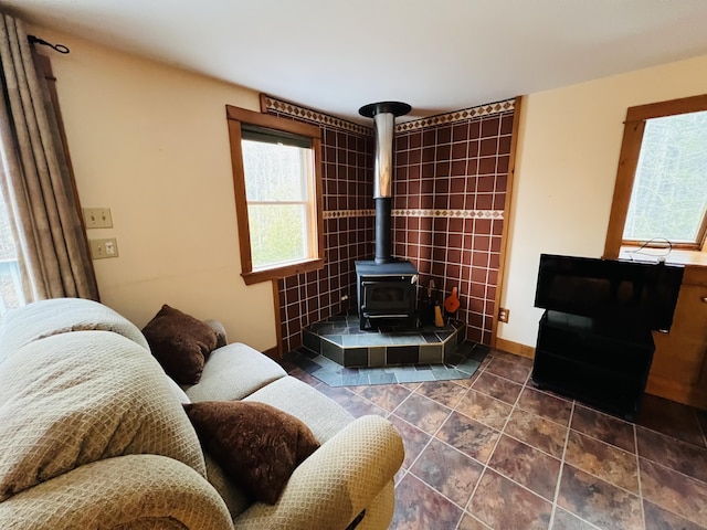 living room featuring a wood stove