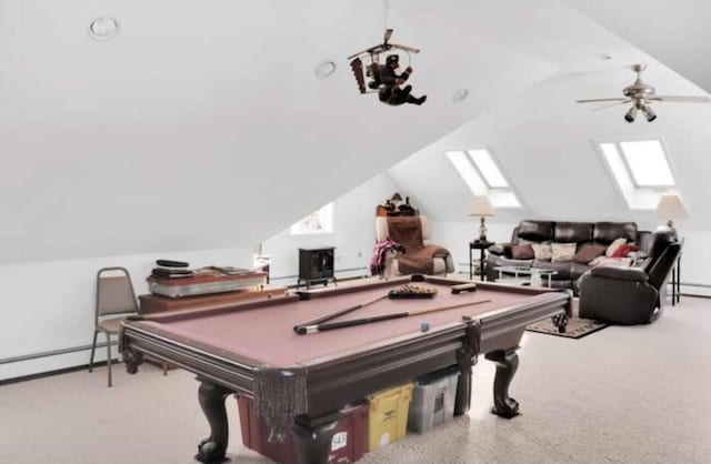 rec room featuring light colored carpet, ceiling fan, lofted ceiling with skylight, and billiards