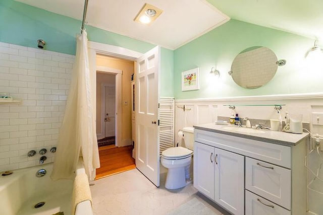 50 Peters Rd, Searsmont, ME 04973 - bathroom with vanity, shower / bath combo, toilet, a wainscoted wall, and lofted ceiling