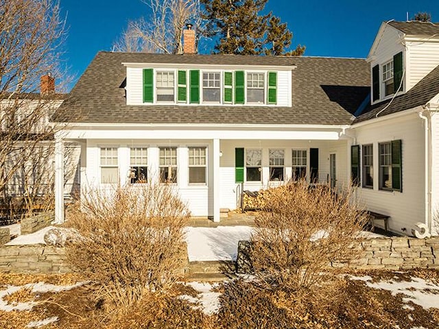 50 Peters Rd, Searsmont, ME 04973 - view of front facade featuring a chimney and roof with shingles