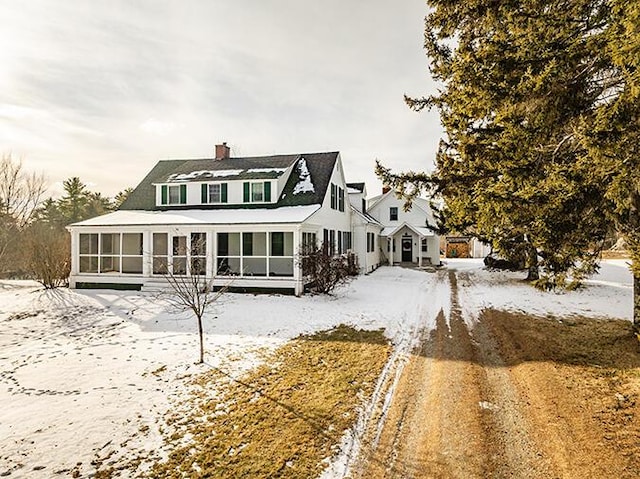 50 Peters Rd, Searsmont, ME 04973 - view of front of home with a sunroom and a chimney