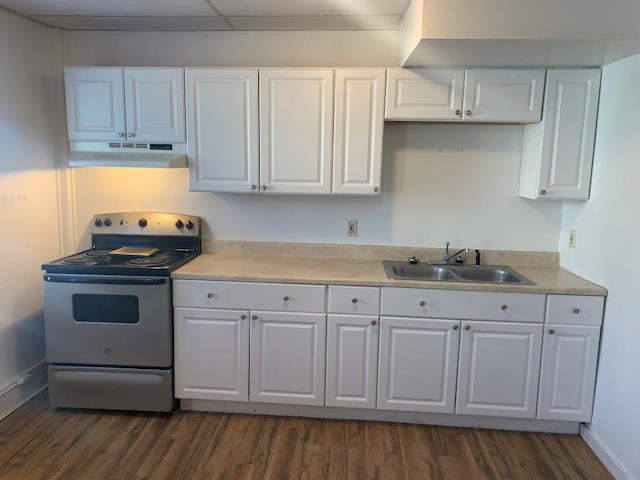 kitchen featuring sink, white cabinets, electric stove, and dark hardwood / wood-style floors