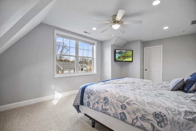 bedroom with carpet floors, ceiling fan, and vaulted ceiling