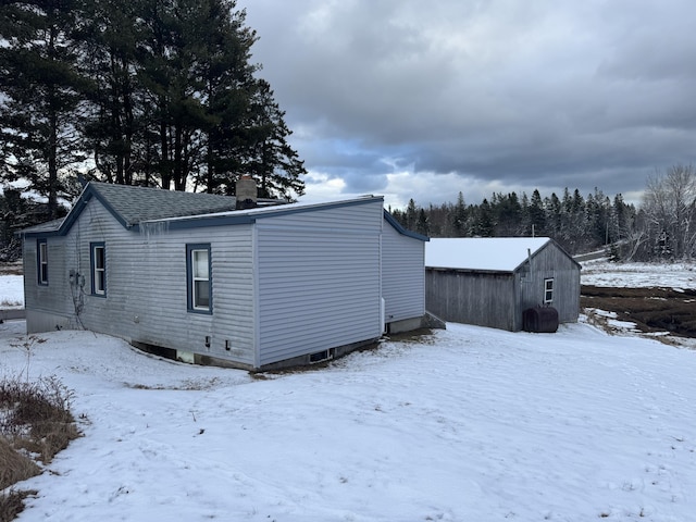 view of snow covered property