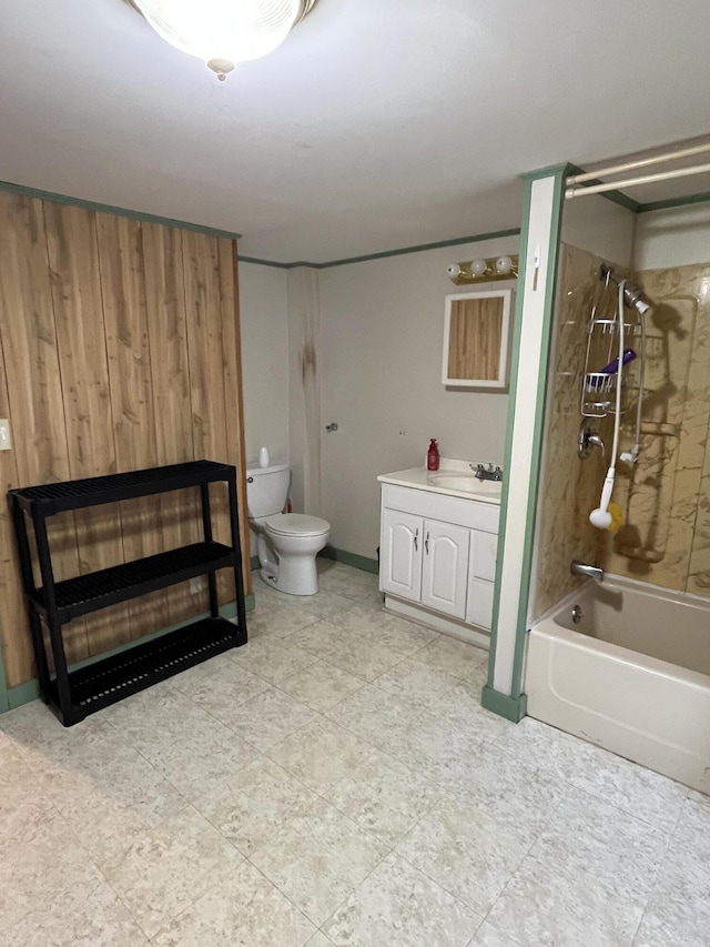 full bathroom featuring toilet, vanity, and tiled shower / bath