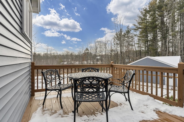 view of snow covered deck