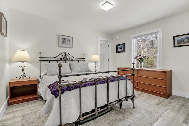 bedroom featuring light hardwood / wood-style flooring