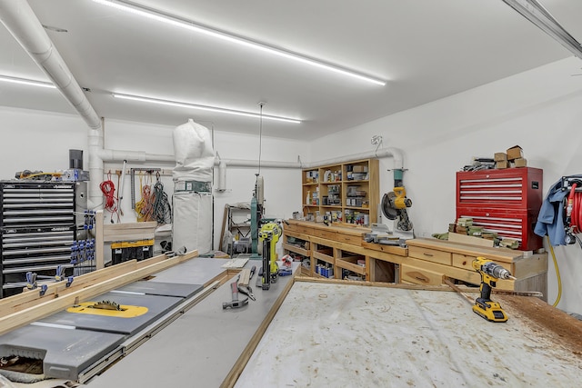 garage with a workshop area