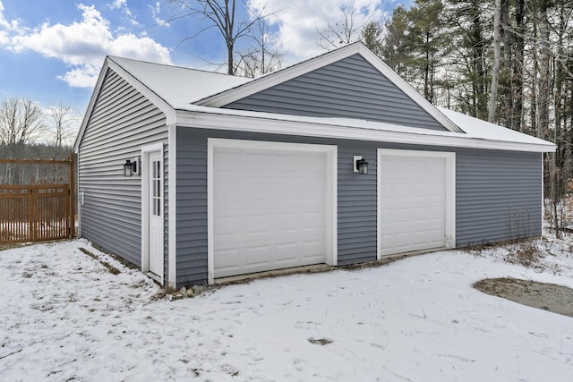 view of snow covered garage