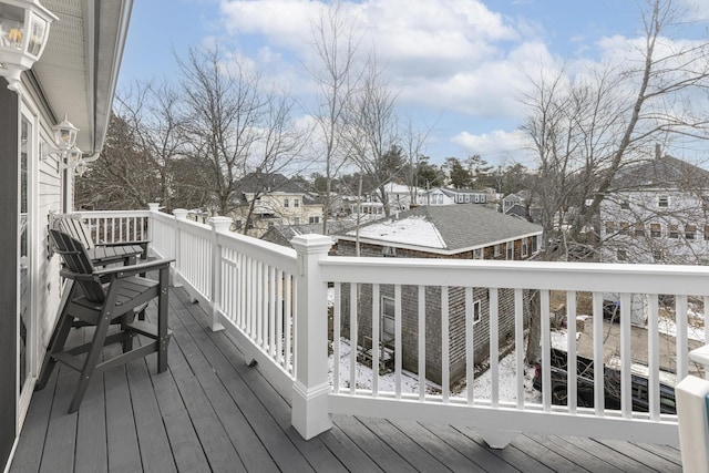 view of snow covered deck