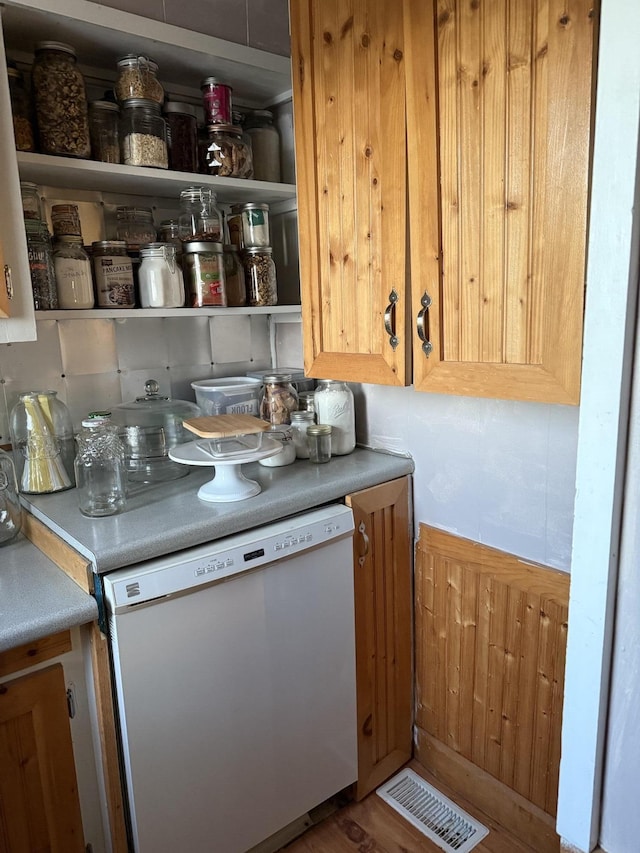 kitchen featuring white dishwasher