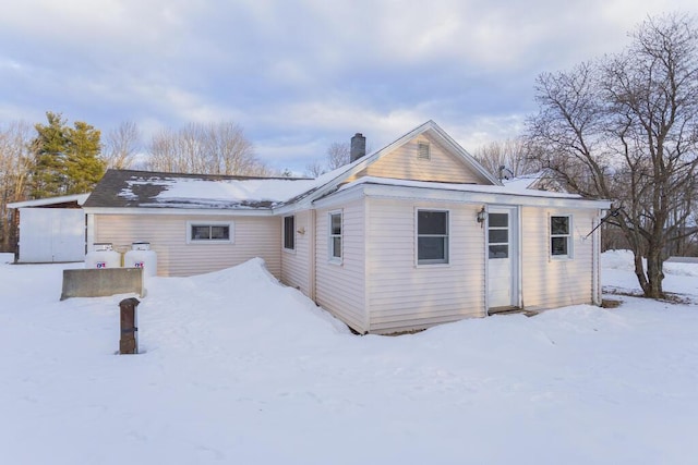 view of snow covered property